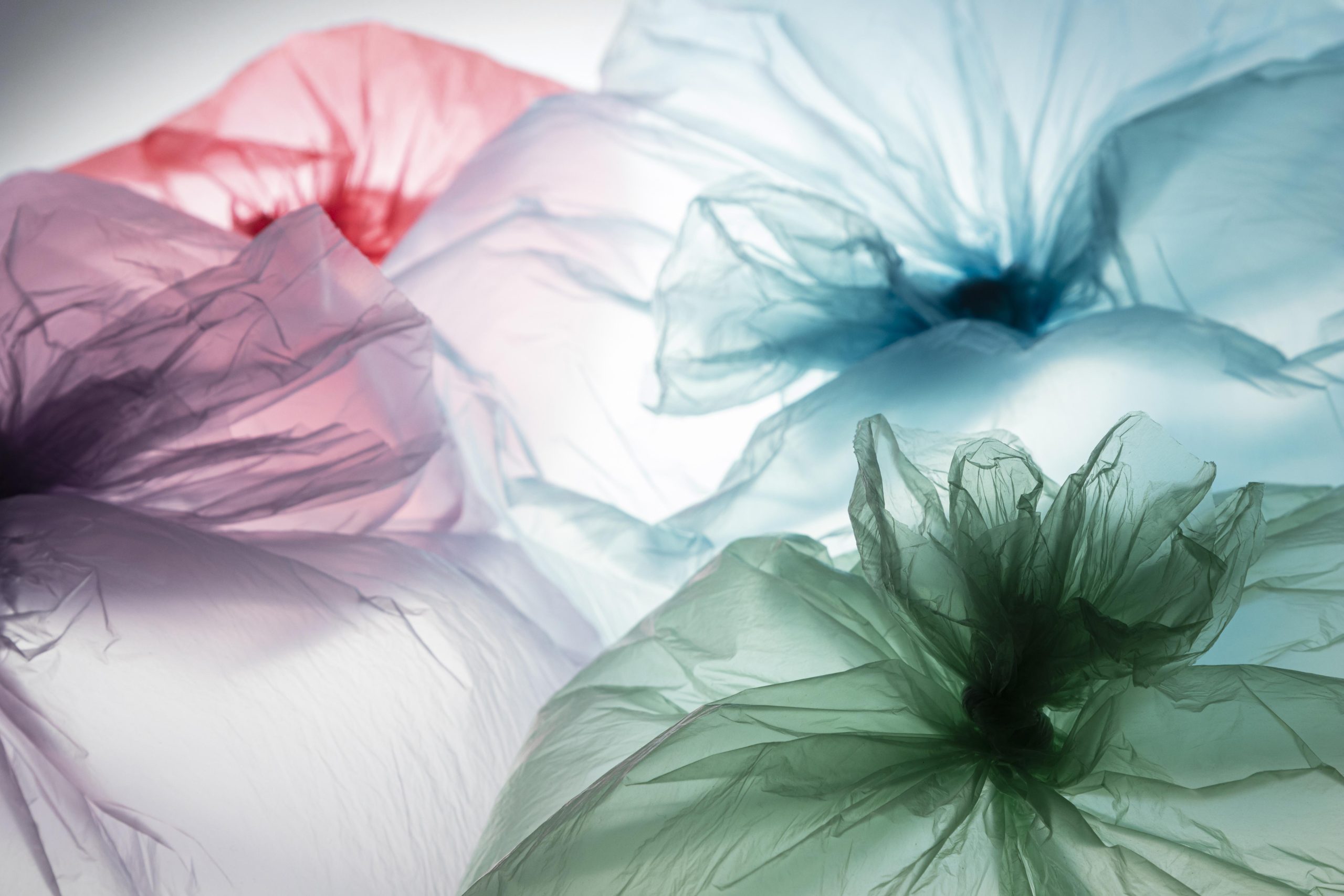4 plastic bags of different color